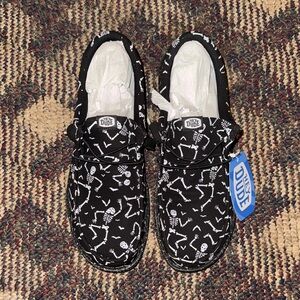 Black with White Glow In The Dark Skeleton Print limited edition release.